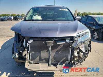 Piąte zdjęcie samochodu w środku: 2017 HONDA PILOT ELITE VIN:5FNYF6H06HB055932 - miniatura