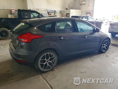 Trzecie zdjęcie samochodu z tyłu: 2017 FORD FOCUS SEL VIN:1FADP3M27HL219533 - miniatura