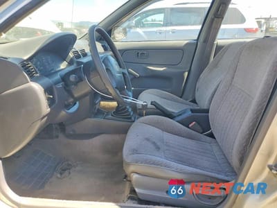 Zdjęcie 7 z 12 samochodu: 1999 NISSAN SENTRA XE VIN:1N4AB41D4XC729673 - miniatura