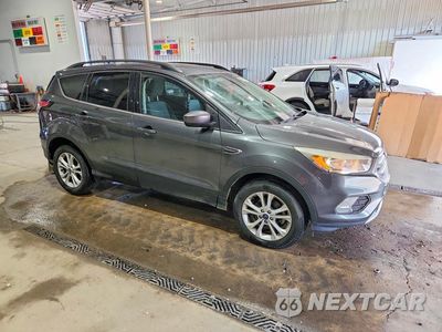 Czwarte zdjęcie samochodu z boku: 2018 FORD ESCAPE SE VIN:1FMCU0GD3JUB84950 - miniatura
