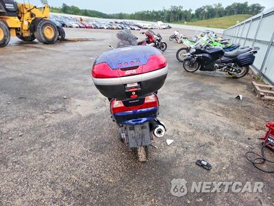 Czwarte zdjęcie samochodu z boku: 2003 SUZUKI AN400 K3 VIN:JS1CK43A932101642 - miniatura