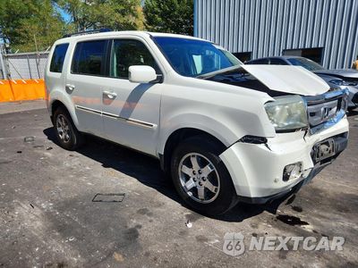 Czwarte zdjęcie samochodu z boku: 2011 HONDA PILOT TOURING VIN:5FNYF4H98BB084603 - miniatura