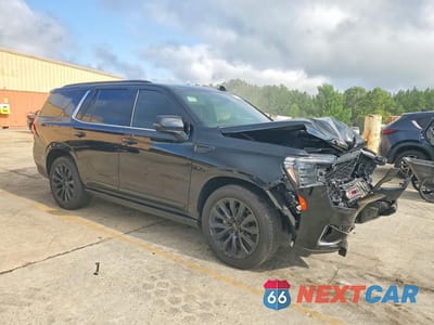 Czwarte zdjęcie samochodu z boku: 2021 GMC YUKON DENALI VIN:1GKS1DKL5MR222365 - miniatura