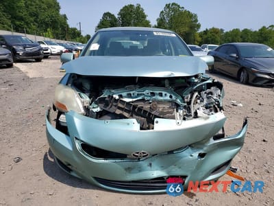 Piąte zdjęcie samochodu w środku: 2009 TOYOTA YARIS BASE VIN:JTDBT903994047452 - miniatura