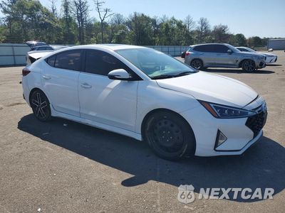 Czwarte zdjęcie samochodu z boku: 2020 HYUNDAI ELANTRA SPORT VIN:KMHD04LB4LU061771 - miniatura