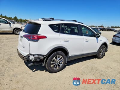 Trzecie zdjęcie samochodu z tyłu: 2018 TOYOTA RAV4 HYBRID XLE VIN:JTMRJREVXJD158188 - miniatura
