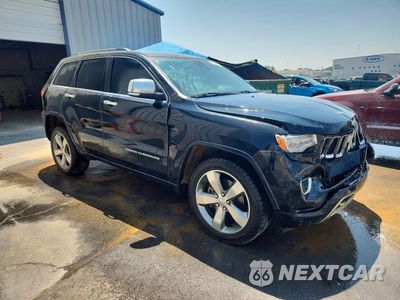 Czwarte zdjęcie samochodu z boku: 2014 JEEP GRAND CHEROKEE OVERLAND VIN:1C4RJFCM1EC305647 - miniatura