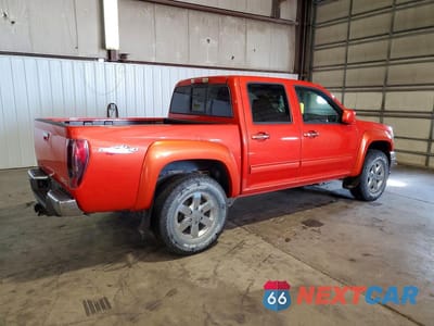 Trzecie zdjęcie samochodu z tyłu: 2012 GMC CANYON SLE-2 VIN:1GTH6PFEXC8128510 - miniatura