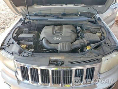 Zdjęcie 12 z 13 samochodu: 2012 JEEP GRAND CHEROKEE LAREDO VIN:1C4RJFAGXCC352847 - miniatura