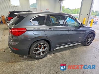 Trzecie zdjęcie samochodu z tyłu: 2016 BMW X1 XDRIVE28I VIN:WBXHT3C31G5E47182 - miniatura