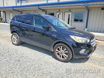 Czwarte zdjęcie samochodu z boku: 2018 FORD ESCAPE SE VIN:1FMCU9GD6JUB76085 - miniatura