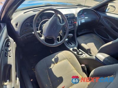 Zdjęcie 8 z 13 samochodu: 2000 FORD MUSTANG VIN:1FAFP4041YF157891 - miniatura