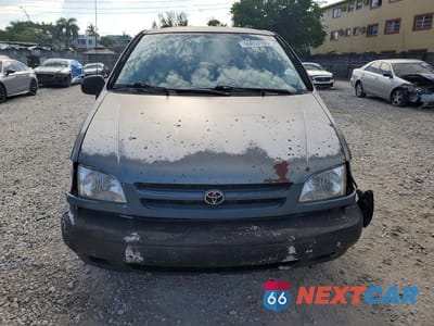 Piąte zdjęcie samochodu w środku: 1999 TOYOTA SIENNA LE VIN:4T3ZF13CXXU123571 - miniatura