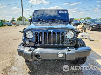 Piąte zdjęcie samochodu w środku: 2015 JEEP WRANGLER UNLIMITED SPORT VIN:1C4BJWDG9FL767479 - miniatura