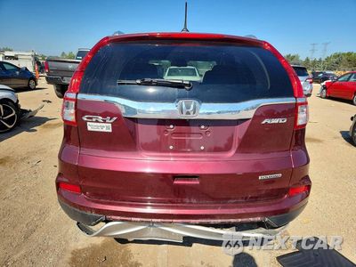 Zdjęcie 6 z 12 samochodu: 2016 HONDA CR-V TOURING VIN:5J6RM4H93GL137412 - miniatura