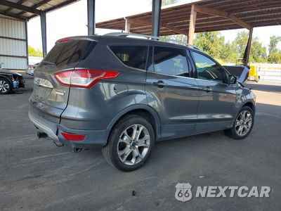 Trzecie zdjęcie samochodu z tyłu: 2016 FORD ESCAPE TITANIUM VIN:1FMCU0JX3GUC43927 - miniatura
