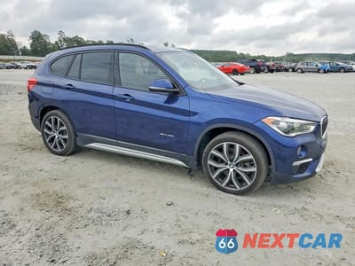 Czwarte zdjęcie samochodu z boku: 2017 BMW X1 SDRIVE28I VIN:WBXHU7C30H5H36432 - miniatura