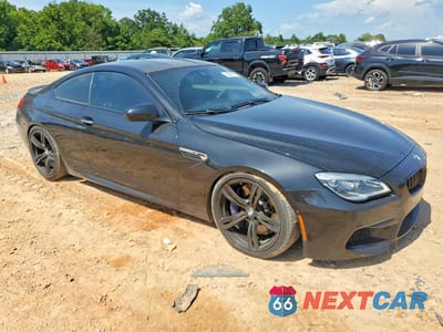 Czwarte zdjęcie samochodu z boku: 2017 BMW M6 VIN:WBS6J9C58HD934715 - miniatura