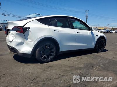 Trzecie zdjęcie samochodu z tyłu: 2023 TESLA MODEL Y VIN:7SAYGDEE9PF621925 - miniatura