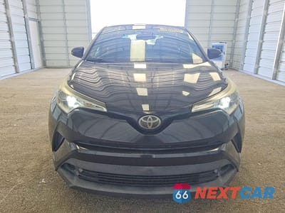 Piąte zdjęcie samochodu w środku: 2018 TOYOTA C-HR XLE VIN:NMTKHMBX9JR055370 - miniatura