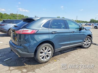 Trzecie zdjęcie samochodu z tyłu: 2019 FORD EDGE TITANIUM VIN:2FMPK4K98KBB31525 - miniatura