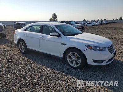 Czwarte zdjęcie samochodu z boku: 2014 FORD TAURUS SEL VIN:1FAHP2H89EG124518 - miniatura