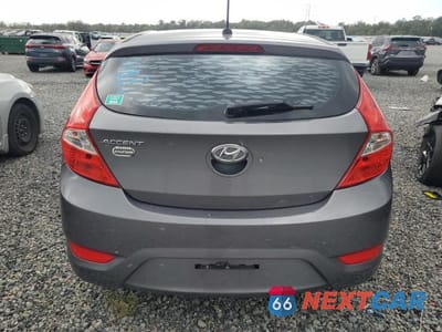 Zdjęcie 6 z 12 samochodu: 2014 HYUNDAI ACCENT GS VIN:KMHCT5AEXEU188629 - miniatura