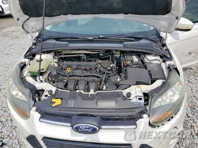 Zdjęcie 12 z 13 samochodu: 2013 FORD FOCUS TITANIUM VIN:1FADP3N27DL149511 - miniatura