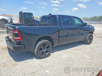 Trzecie zdjęcie samochodu z tyłu: 2021 RAM 1500 BIG HORN/LONE STAR VIN:1C6SRFFT1MN696242 - miniatura