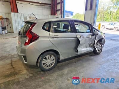 Trzecie zdjęcie samochodu z tyłu: 2016 HONDA FIT LX VIN:JHMGK5H51GX003480 - miniatura