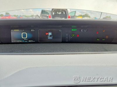 Zdjęcie 9 z 12 samochodu: 2021 TOYOTA PRIUS LE AWD-E VIN:JTDL9MFU7M3030797 - miniatura