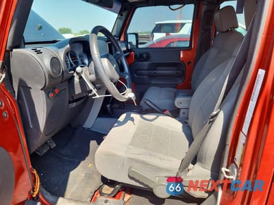 Zdjęcie 7 z 12 samochodu: 2009 JEEP WRANGLER UNLIMITED RUBICON VIN:1J4GA69199L769399 - miniatura