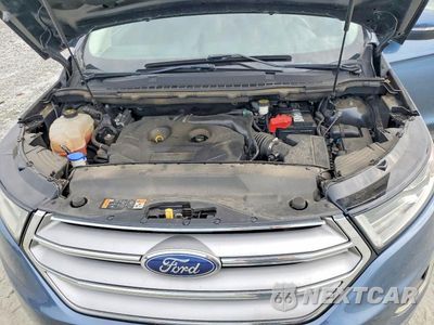 Zdjęcie 12 z 13 samochodu: 2018 FORD EDGE SEL VIN:2FMPK4J92JBC34486 - miniatura