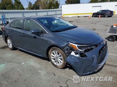 Czwarte zdjęcie samochodu z boku: 2023 TOYOTA COROLLA HYBRID XLE VIN:JTDBCMFE4P3012722 - miniatura