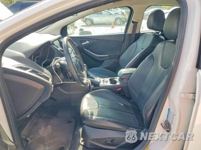 Zdjęcie 7 z 12 samochodu: 2014 FORD FOCUS TITANIUM VIN:1FADP3N22EL195927 - miniatura