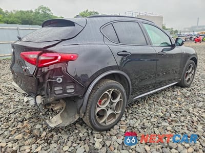 Trzecie zdjęcie samochodu z tyłu: 2023 ALFA ROMEO STELVIO TI VIN:ZASPAKBN1P7D56675 - miniatura