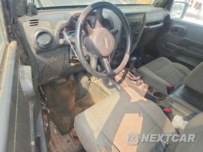 Zdjęcie 8 z 12 samochodu: 2007 JEEP WRANGLER SAHARA VIN:1J4GA59107L185853 - miniatura