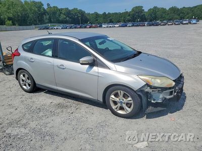 Czwarte zdjęcie samochodu z boku: 2014 FORD FOCUS SE VIN:1FADP3K24EL288050 - miniatura