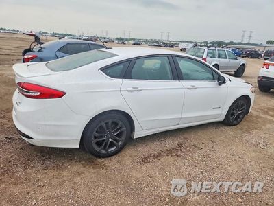 Trzecie zdjęcie samochodu z tyłu: 2018 FORD FUSION SE HYBRID VIN:3FA6P0LU4JR269887 - miniatura