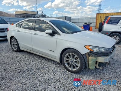 Czwarte zdjęcie samochodu z boku: 2019 FORD FUSION SE VIN:3FA6P0LU0KR201474 - miniatura
