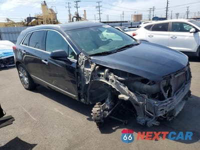 Czwarte zdjęcie samochodu z boku: 2019 CADILLAC XT5 PREMIUM LUXURY VIN:1GYKNERS4KZ246621 - miniatura