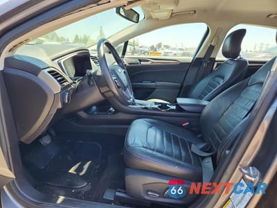 Zdjęcie 7 z 12 samochodu: 2014 FORD FUSION SE PHEV VIN:3FA6P0PUXER256237 - miniatura