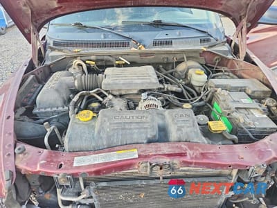 Zdjęcie 11 z 12 samochodu: 2003 DODGE DAKOTA QUAD SLT VIN:1D7HG48N23S204755 - miniatura