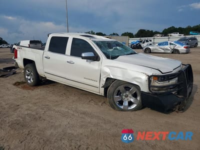 Czwarte zdjęcie samochodu z boku: 2018 CHEVROLET SILVERADO K1500 LTZ VIN:3GCUKSEC1JG555708 - miniatura