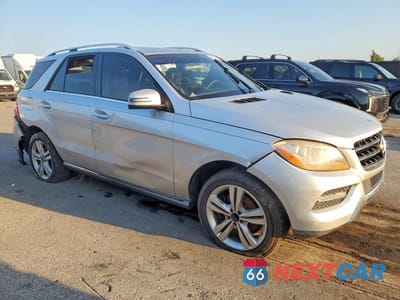 Czwarte zdjęcie samochodu z boku: 2015 MERCEDES-BENZ ML 350 VIN:4JGDA5JB2FA464000 - miniatura