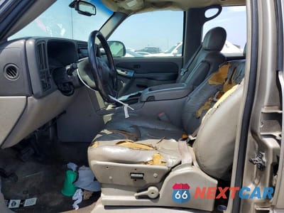 Zdjęcie 7 z 13 samochodu: 2003 GMC YUKON XL C1500 VIN:1GKEC16T13J145569 - miniatura