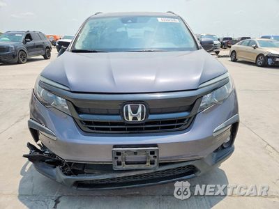 Piąte zdjęcie samochodu w środku: 2021 HONDA PILOT SE VIN:5FNYF5H29MB034482 - miniatura