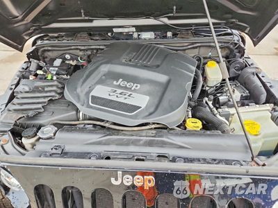 Zdjęcie 11 z 12 samochodu: 2013 JEEP WRANGLER SPORT VIN:1C4AJWAG0DL653786 - miniatura