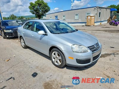 Czwarte zdjęcie samochodu z boku: 2009 VOLKSWAGEN JETTA SE VIN:3VWRM71KX9M088907 - miniatura