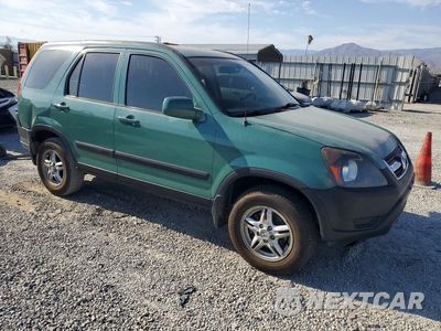 Czwarte zdjęcie samochodu z boku: 2004 HONDA CR-V LX VIN:JHLRD78484C032262 - miniatura
